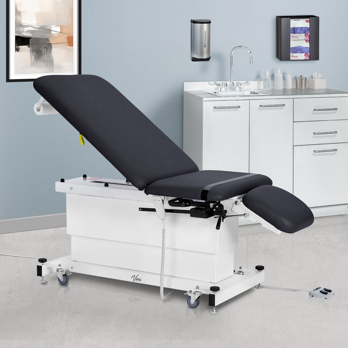 XRO Power Hi-Lo Exam Table. Shrouded Base w/ 3-Section Top & Stirrups (Adjustable Back, Leg-Rest Drop Section & Antimicrobial Upholstery)