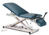 Power Hi-Lo Exam Table. Open Base w/ Adjustable Back, Drop Section, Footrest & Stirrups. 400 lbs Capacity