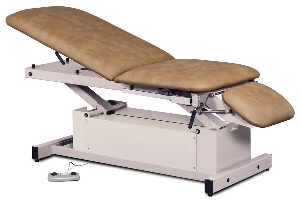 Power Glide Hi-Lo Exam Table w/ Adjustable Backrest, Drop Section, Stirrups & Footrest. Shrouded Base