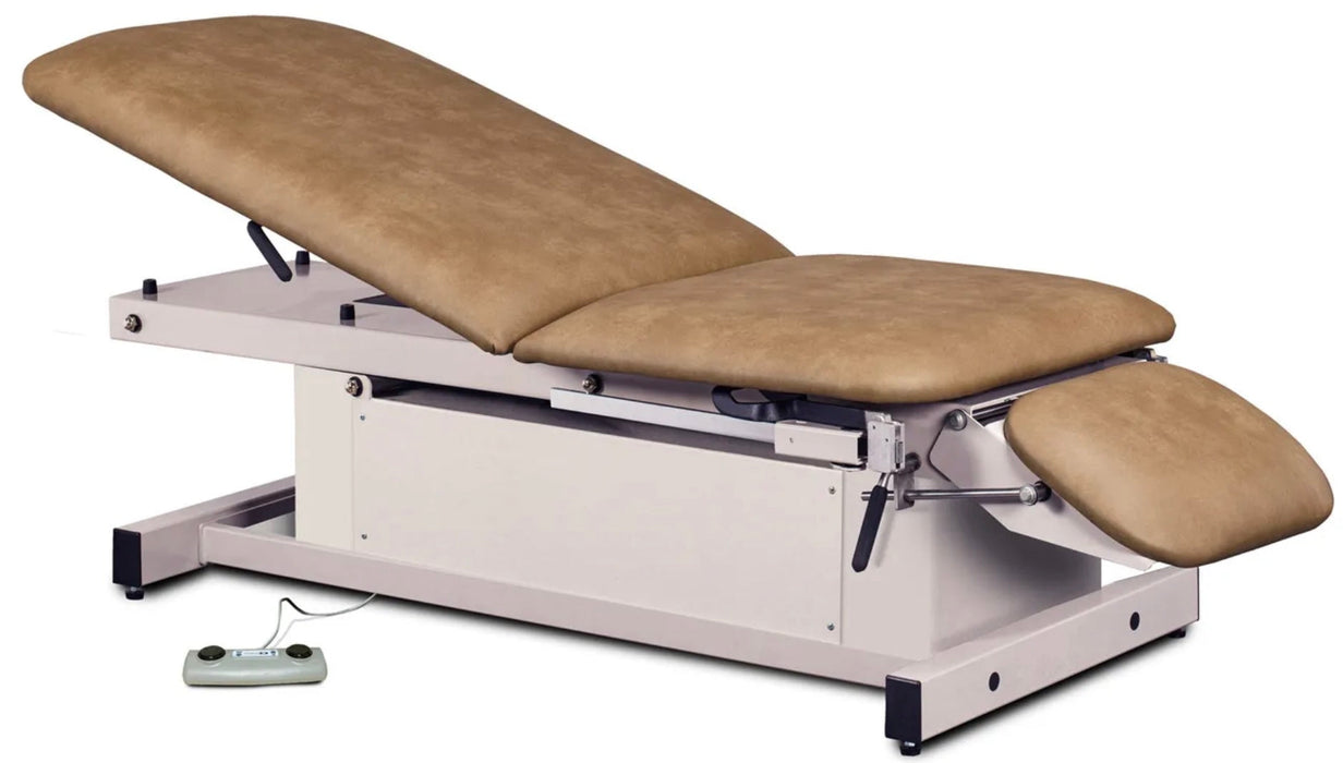 Power Glide Hi-Lo Exam Table w/ Adjustable Backrest, Drop Section, Stirrups & Footrest. Shrouded Base